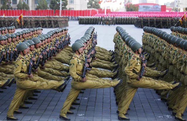 North Korean soldiers in historic uniforms march during a parade on the Kim Il Sung Square, Saturday, October 10, 2015, in Pyongyang, North Korea. (Photo by Wong Maye-E/AP Photo)