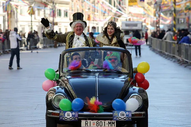 Rally Paris – Bakar with old vintage cars and all participants wear masks as part of the International Rijeka Carnival, in Rijeka, Croatia, on February 4, 2018. (Photo by Goran Kovacic/Xinhua/Barcroft Images)