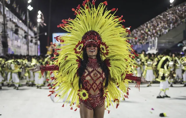 A member of the Grupo Especial Sao Clemente samba school takes part in the Carnival celebration at the Marques de Sapucai sambodrome in Rio de Janeiro, Brazil, 11 February 2018. (Photo by Marcelo Sayao/EPA/EFE)