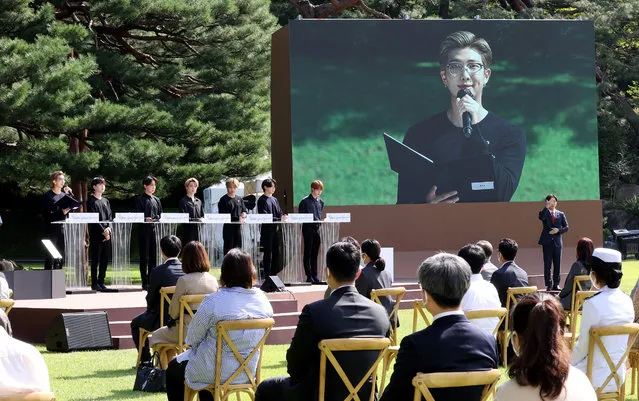 Members of K-pop boy band BTS deliver a speech encouraging younger generations during the inaugural Youth Day event at Nokjiwon, a verdant garden inside the presidential compound Cheong Wa Dae, in Seoul, South Korea, 19 September 2020. (Photo by Yonhap/EPA/EFE/Rex Features/Shutterstock)