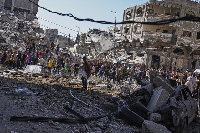 Palestinians inspect the damage after an Israeli strike on a residential building in Gaza City, Friday, June 27, 2025. (Photo by Jehad Alshrafi/AP Photo)