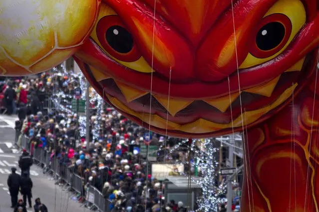 A float makes its way down 6th Ave during the Macy's Thanksgiving Day Parade, in New York November 27, 2014. (Photo by Carlo Allegri/Reuters)