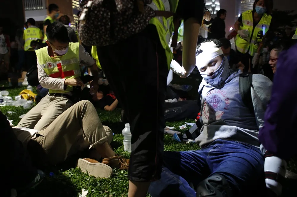 Hong Kong Protesters Scuffle with Police