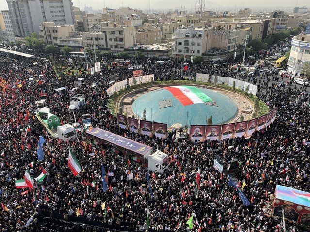 Iranians attend a funeral ceremony for Iranian IRGC generals and scientists who were killed in recent Israeli airstrikes, in Tehran, Iran, 28 June 2025. Israel has been conducting a campaign across Iran since 13 June, targeting nuclear, military, and energy facilities, prompting Iran to launch retaliatory waves of missiles and drones toward Israel. (Photo by Abedin Taherkenareh/EPA)