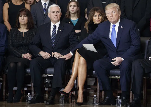 (L-R) Second lady Karen Pence, U.S. Vice President Mike Pence, first lady Melania Trump and President Donald Trump attend the cermonies as the late evangelist Billy Graham lies in repose at the U.S. Capitol, on February 28, 2018 in Washington, DC. Rev. Graham is being honored by Congress by lying in repose inside of the U.S. Capitol Rotunda for 24 hours. Graham was the nation's best know Christian evangelist, preaching to millions worldwide, as well as being an advisor to US presidents over his 6 decade career. (Photo by Shawn Thew-Pool/Getty Images)