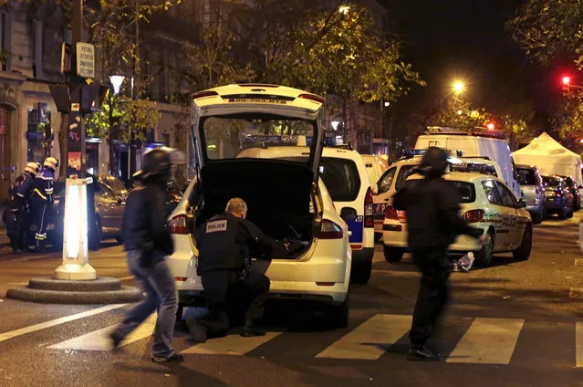 French police secure the area near the Bataclan concert hall following fatal shootings in Paris, France, November 13, 2015. (Photo by Philippe Wojazer/Reuters)