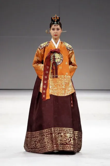A Model walks down the catwalk during the South Korean Traditional Costume “HanBok” fashion show at Gyeongbok Palace on October 22, 2016 in Seoul, South Korea. (Photo by Chung Sung-Jun/Getty Images)