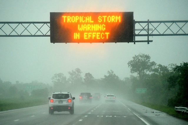Tropical storm warning signs are up along U.S. 74/76 on August 7, 2024, as Tropical Storm Debby continues to move up the southeastern coast. (Photo by Ken Blevins/Star News via USA TODAY Network)