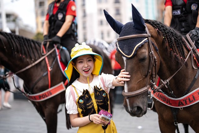 Mounted police patrol in Istiklal Street in Istanbul, Turkiye on September 09, 2024. Mounted police officers from the Istanbul Police Department, stationed at various locations throughout the city, particularly at tourist spots, have become popular with both locals and foreign visitors. The Mounted Police Group Directorate, a branch of the Riot Police Department, is responsible for a range of activities including preventive services, social events, official ceremonies, inspections of forests and promenades, as well as monitoring coastal areas, parks, and tourist destinations. (Photo by Hakan Akgun/Anadolu via Getty Images)