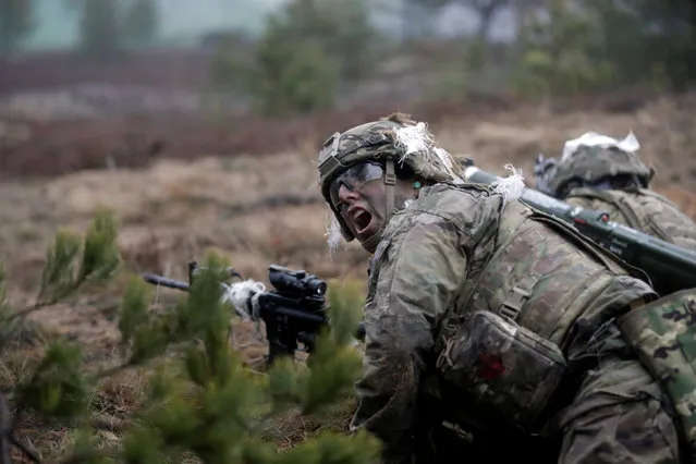 U.S. soldiers take part in a live shooting exercise during U.S. operation “Atlantic Resolve” in Adazi, Latvia November 11, 2016. (Photo by Ints Kalnins/Reuters)