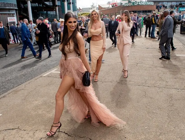Race goers enjoying Grand National Day at the Randox Grand National Festival at Aintree, Liverpool, Britain, 09 April 2022. This year's Grand National is the 174th edition of the legendary annual horse race at the Aintree Racecourse in Liverpool. (Photo by Peter Powell/EPA/EFE)