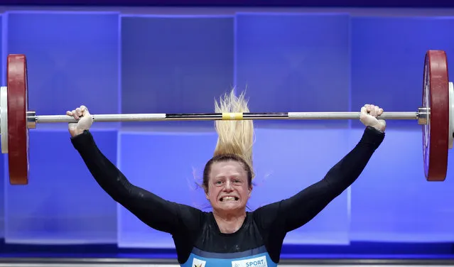 Nathalie Lebbe of Belgium in action during the women's 59kg category at the 2021 EWF European Weightlifting Championships, in Moscow, Russ​ia, 05 April 2021. (Photo by Maxim Shipenkov/EPA/EFE)