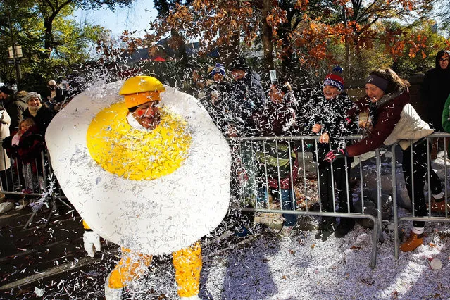 A performer takes part in the 92nd annual Macy's Thanksgiving Day Parade in New York, Thursday, November 22, 2018. (Photo by Eduardo Munoz Alvarez/AP Photo)
