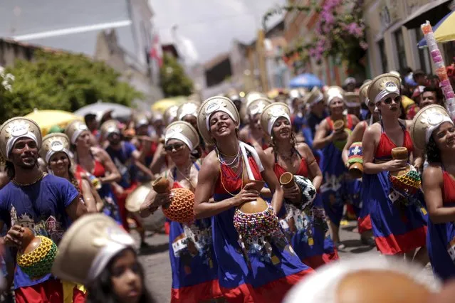 Revellers attend a carnival party in a neighborhood in Olinda, Brazil February 9, 2016. (Photo by Ueslei Marcelino/Reuters)
