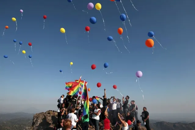 Members of LGBT organizations participate in the “A different day” event, which is held every leap year to raise awareness for the respect of human rights and to fight against bullying, at the La Puerta del Diablo park in San Salvador, El Salvador, February 29, 2016. (Photo by Jose Cabezas/Reuters)