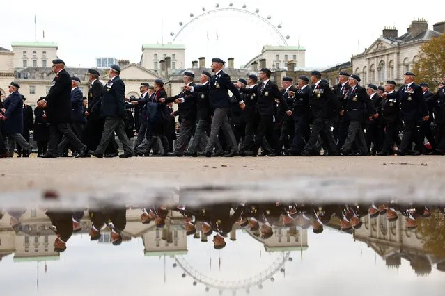 Veteran soldiers walk on Horse Guards Parade after the National Service of Remembrance at the Cenotaph in Westminster, London, Britain on November 12, 2023. (Photo by Hannah McKay/Reuters)