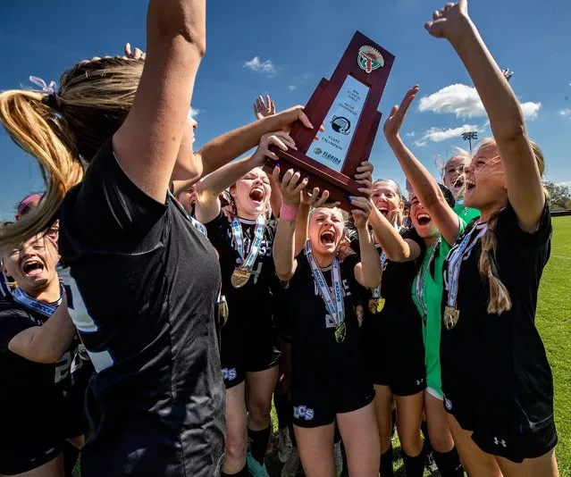 Lakeland Christian soccer players celebrate after winning the Championship game at Lake Myrtle Sports Complex in Auburndale, Florida on February 23, 2024. (Photo by Ernst Peters/The Ledger via USA TODAY Network)