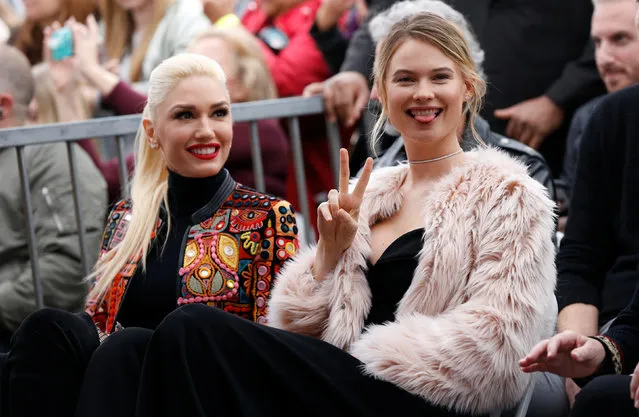 Model Behati Prinsloo (R) and singer Gwen Stefani attend the ceremony for the unveiling of the star for musician Adam Levine on the Hollywood Walk of Fame in the Hollywood neighborhood of Los Angeles, California U.S., February 10, 2017. (Photo by Mario Anzuoni/Reuters)