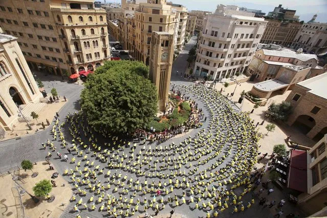 Lebanese students dance during “The Big Dance” event in downtown Beirut, near the parliament May 9, 2015. (Photo by Aziz Taher/Reuters)