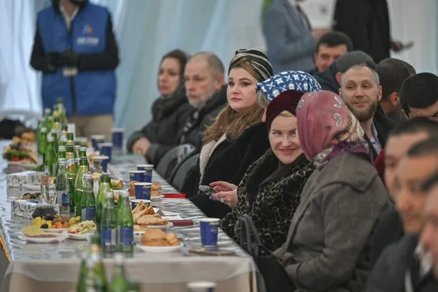 People attend the first iftar program of Ramadan at the Memorial Mosque in Moscow, Russia on March 11, 2024. (Photo by Sefa Karacan/Anadolu via Getty Images)