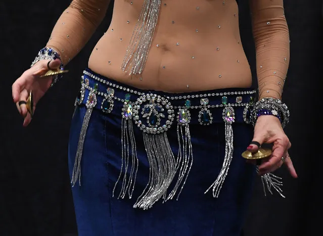 A Belly Dancer competes in the Open Dance category of the 2017 “Belly Dancer of the Universe Competition” in Long Beach, California, on February 19, 2017. The annual competition sees dancers from all over the world competing for prizes in six different categories. (Photo by Mark Ralston/AFP Photo)