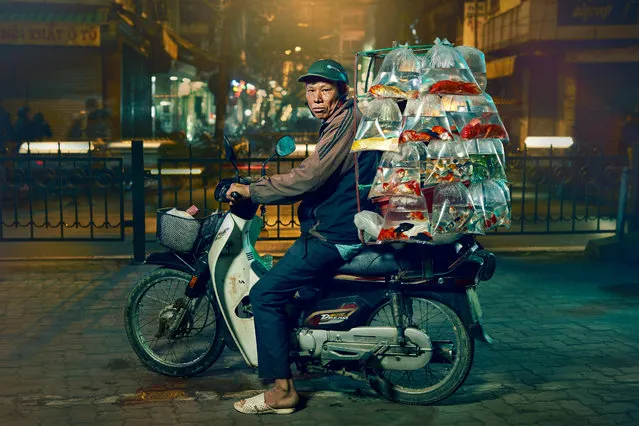 Live fish. Vietnam has the highest number of motorbikes in all of south-east Asia – Hanoi alone has 5m of them, and only half a million cars. Now the city is planning to ban them by 2030 to cut pollution. (Photo by Jon Enoch/The Guardian)