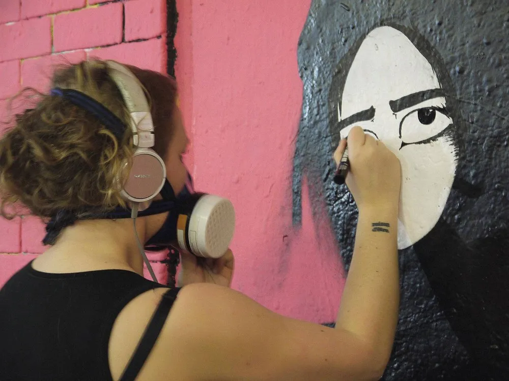 Female Street Artists set Guinness World Record for Largest Mural Painted by a Team