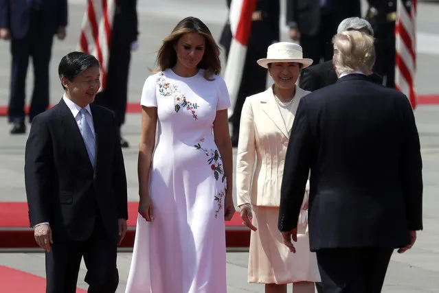 President Donald Trump and first lady Melania Trump participate with Japanese Emperor Naruhito and Japanese Empress Masako during an Imperial Palace welcome ceremony at the Imperial Palace, Monday, May 27, 2019, in Tokyo. (Photo by Evan Vucci/AP Photo)