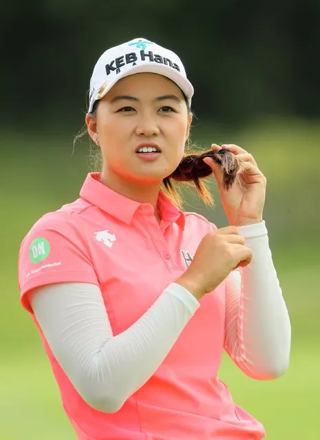 Minjee Lee of Australia plays with her hair on the fifth hole during the first round of  the HSBC Women's Champions on the Tanjong Course at Sentosa Golf Club on March 2, 2017 in Singapore. (Photo by Andrew Redington/Getty Images)