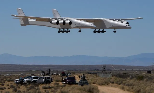 The Stratolaunch plane, the world's largest, does its 2nd test fight as it comes in for a landing after it performed a 4hr test flight in Mojave, California, U.S., April 29, 2021. The plane, designed to transport hypersonic vehicles and facilitate easy access to space, made its second test flight, two years after its first voyage. (Photo by Gene Blevins/Reuters)