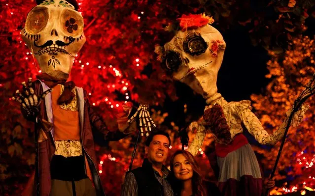 Members of the public visit the Calaverandia theme park, installed on the occasion of the Day of the Dead celebrations in Guadalajara, Mexico, 22 October 2019. (Photo by Francisco Guasco/EPA/EFE)
