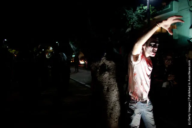 Israelis participate in a Zombie Walk during the Jewish holiday of Purim