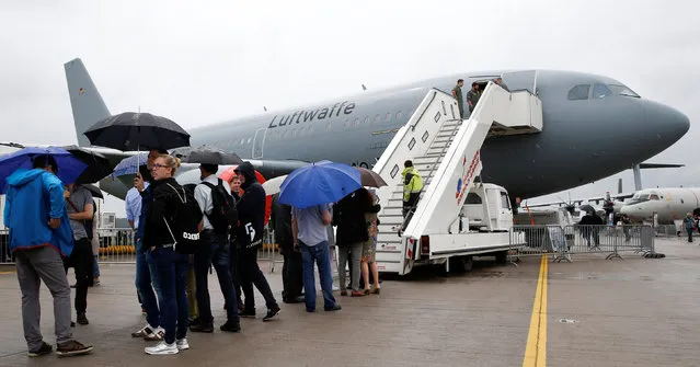 Visitors queue to visit an Airbus A310-304 MRTT of the German Air Force at the ILA Berlin Air Show in Schoenefeld, south of Berlin, Germany, June 1, 2016. (Photo by Fabrizio Bensch/Reuters)