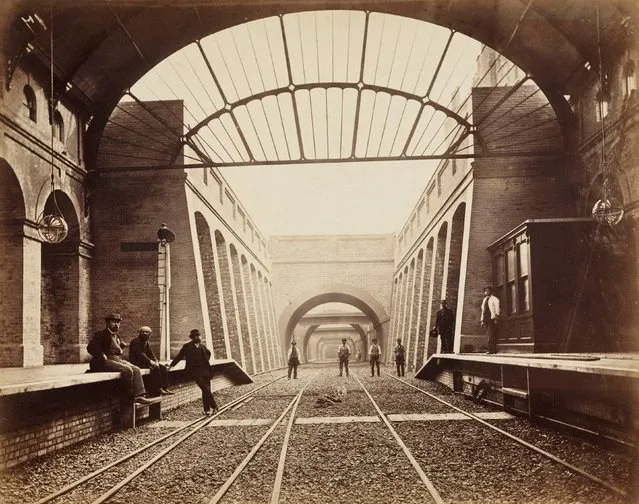 One of a series of photographs by Henry Flather showing the construction, undertaken between 1866 and 1870, of the Metropolitan District Railway's (MDR) underground lines between Paddington and Blackfriars via Kensington. It shows Notting Hill Gate Station shortly before it opened in 1868. The line laid by the MDR from the 1860s onwards was designed to provide a rail connection for travellers between London's mainline railway terminals, situated in a ring around the city centre. It now forms part of the existing District and Circle Lines on the London Underground. The construction work, utilising the “cut and cover” technique, caused much disruption to London neighbourhoods. (Photo by SSPL/Getty Images)