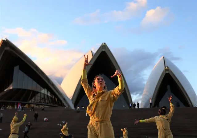 Dancers perform on the monumental steps at Sydney Opera House on May 18, 2022 in Sydney, Australia. “Encounter Sydney” is a site-specific dance work featuring dancers from Western-Sydney-based company WE ARE HERE. (Photo by Mark Metcalfe/Getty Images)