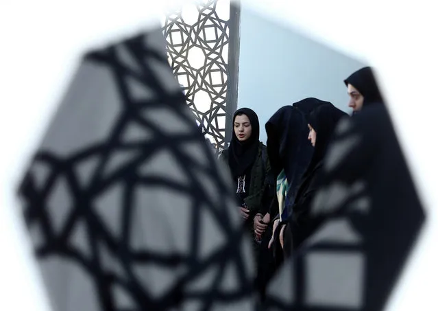 Iranian women pray as they commemorate the Arbaeen in Tehran, Iran on October 19, 2019. (Photo by Nazanin Tabatabaee/WANA (West Asia News Agency) via Reuters)