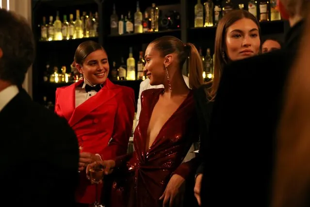 Bella Hadid and models enjoy beverages after presenting creations from the Ralph Lauren collection during New York Fashion Week in Manhattan, New York, U.S., September 7, 2019. (Photo by Caitlin Ochs/Reuters)