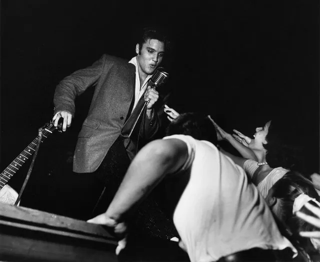 Elvis performs during his first tour in the Olympia Theater, Miami, 1956. (Photo by Fred Ward/Award Agency)
