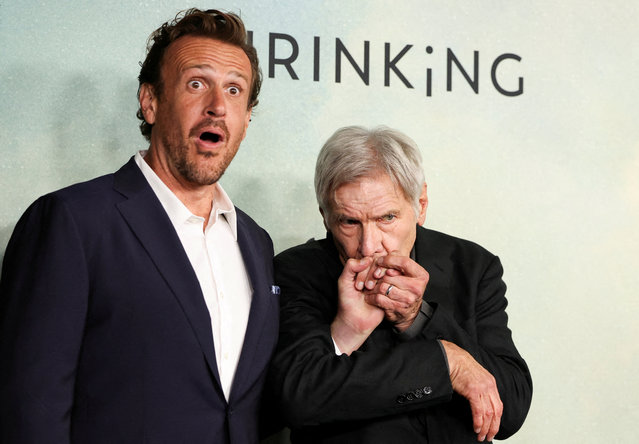 Cast member Harrison Ford kisses Jason Segel's hand as they attend a premiere for Season 2 of the television series “Shrinking”, at Pacific Design Center in West Hollywood, California, U.S., October 8, 2024. (Photo by Mario Anzuoni/Reuters)