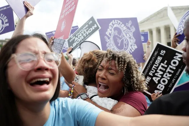 Anti-abortion demonstrators celebrate outside the United States Supreme Court as the court rules in the Dobbs v Women’s Health Organization abortion case, overturning the landmark Roe v Wade abortion decision in Washington, U.S., June 24, 2022. (Photo by Evelyn Hockstein/Reuters)