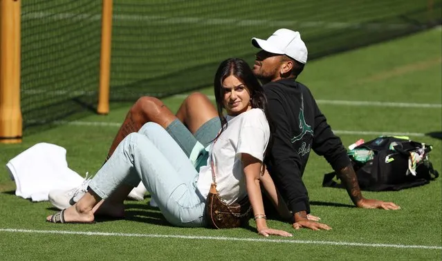Nick Kyrgios of Australia is seen during a practice session with girlfriend Costeen Hatzi on day twelve of The Championships Wimbledon 2022 at All England Lawn Tennis and Croquet Club on July 08, 2022 in London, England. (Photo by Julian Finney/Getty Images)