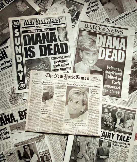 Sunday's editions of New York City's newspapers carry headlines of the auto accident that killed Princess Diana, her friend Dodi Fayed, and their chauffeur early Sunday morning, August 31, 1997, in Paris, France. The crash happen shortly after midnight in a tunnel along the River Seine, while being chased by photographers on motorcycles. (Photo by Adam Nadel/AP Photo)