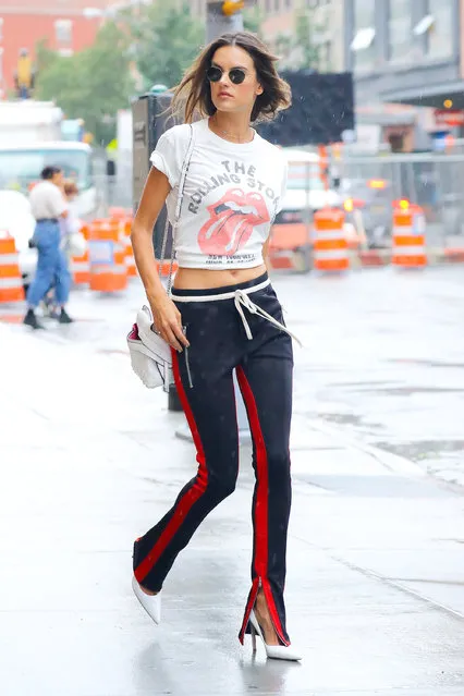 Alessandra Ambrosio wore The Rolling Stones crop top while out and about in New York City on August 29, 2017. (Photo by Felipe Ramales/Splash News and Pictures)