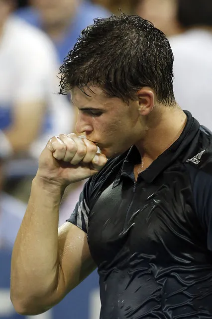 Dominic Thiem, of Austria, reacts after defeating Feliciano Lopez, of Spain, during the third round of the U.S. Open tennis tournament Sunday, August 31, 2014, in New York. (Photo by Jason DeCrow/AP Photo)