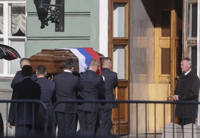 Employees transfer the coffin with the remains of the late former Soviet president Mikhail Gorbachev for a farewell ceremony to the Hall of Columns of the House of Trade Unions in Moscow, Russia, 03 September 2022. Former Soviet leader Mikhail Gorbachev died on 30 August 2022 at the age of 91 in Moscow Central Clinical Hospital. Gorbachev initiated numerous reforms during his tenure. He signed a nuclear arms treaty with the United States and withdrew the Soviet Union from the Soviet-Afghan war. His policies created freedom of speech and press, and decentralized fiscal policy planning and execution to increase efficiency. Gorbachev was the last leader of the Soviet Union, overseeing Russia transition from one party rule to a fragile democracy. (Photo by Maxim Shipenkov/EPA/EFE)