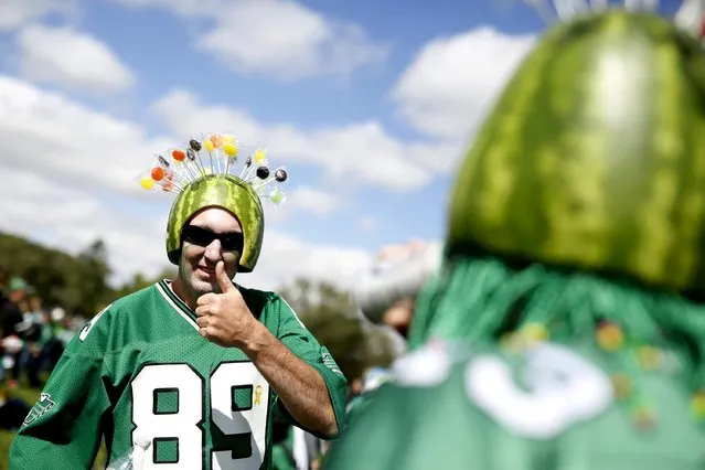 Saskatchewan Roughrider fan Ken Meraw gives the thumbs up before the Riders vs Winnipeg Blue Bombers CFL football game in Regina, Saskatchewan September 6, 2015. (Photo by David Stobbe/Reuters)