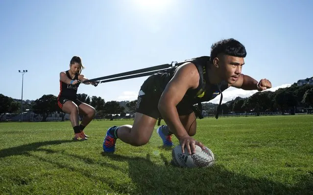 Hurricanes player Xavier Numia and Black Ferns player Marcelle Parkes train in isolation at Polo Ground Park due to the coronavirus lockdown on May 06, 2020 in Wellington, New Zealand. New Zealand has been in lockdown since Thursday 26 March following tough restrictions imposed by the government to stop the spread of COVID-19 across the country. (Photo by Hagen Hopkins/Getty Images)