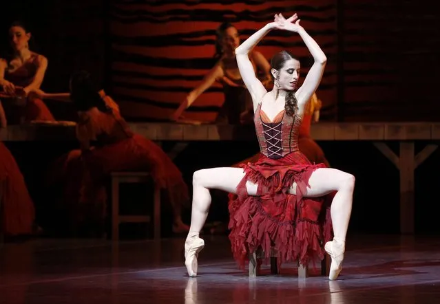 Uruguayan ballet dancer of the Uruguayan National Ballet Maria Noel Riccetto performs during the opera “Carmen”, by French composer Georges Bizet, in Montevideo, Uruguay, 11 August 2016. (Photo by Javier Roibas Veiga/EPA)