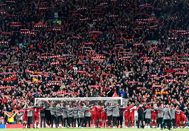 Celebration: silver. Liverpool players stand in front of their fans after their remarkable Champions League semi-final fightback against Barcelona. (Photo by Neil Hall)