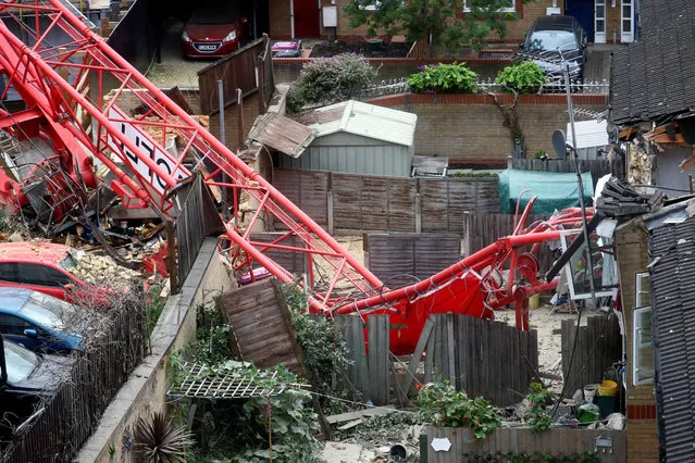 A collapsed crane is seen near a construction site in Bow, east London, Britain, July 8, 2020. (Photo by Hannah McKay/Reuters)